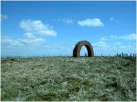 Striding Arch at the top of Colt Hill (with the trig point behind it)..png
